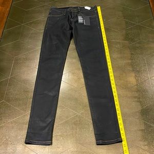Black Flying Monkey jeans with tags. Size 26 with 38” L.